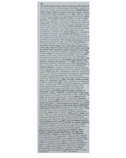A  ingredient list page with dense black text on a white sheet, photographed against a light neutral background.